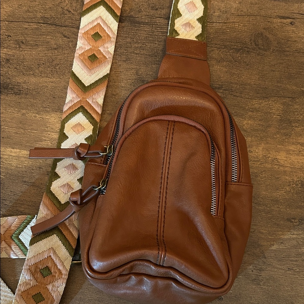 Bohemian leather backpack with adjustable canvas strap